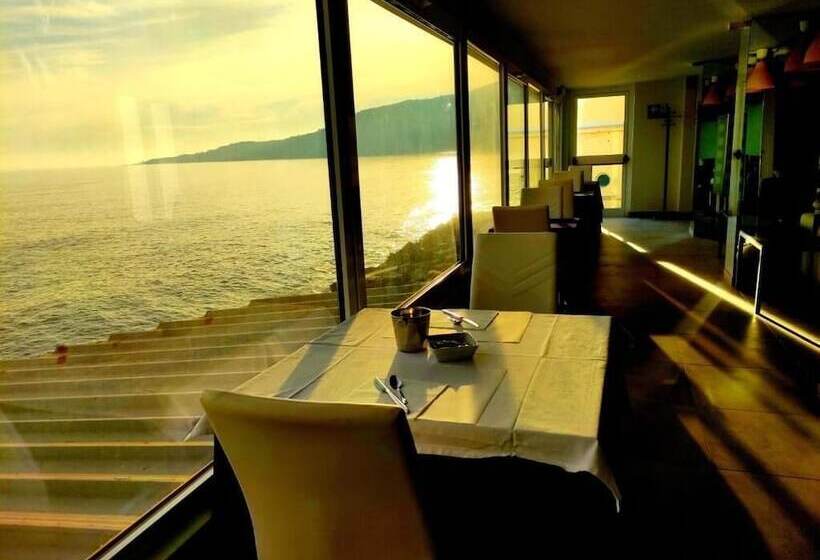 호텔 La Perla Del Capo