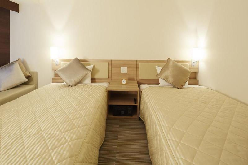 Отель Rich Sapporo