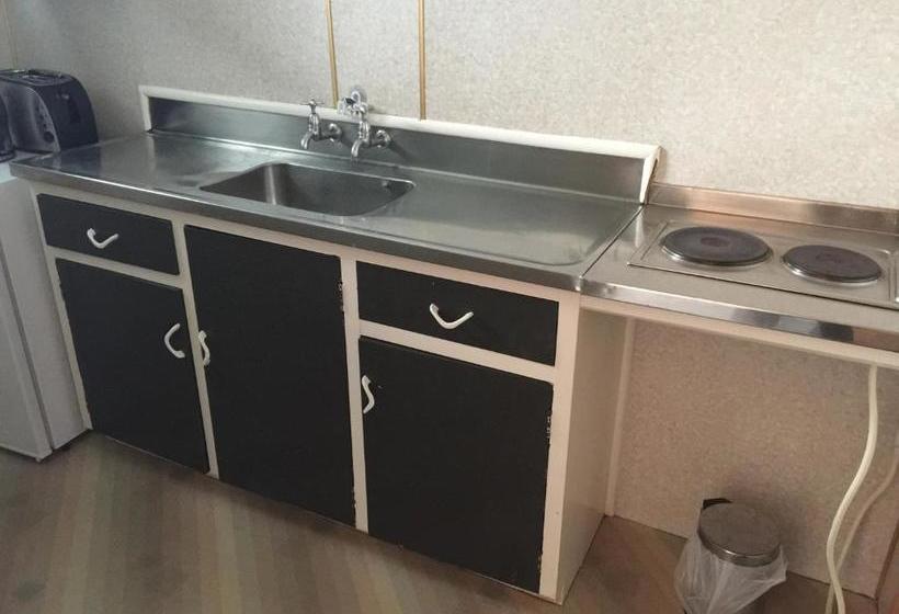 فندق Mid City Motor Lodge