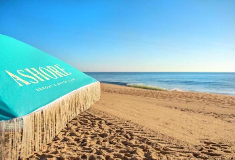 酒店 Ashore Resort & Beach Club