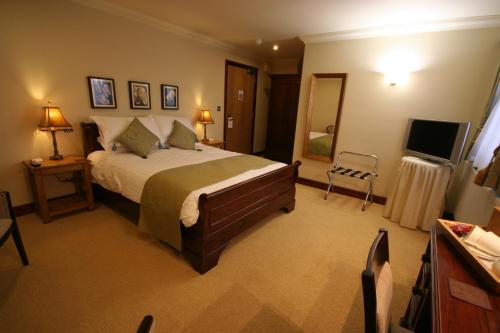 호텔 Three Horseshoes Country Inn