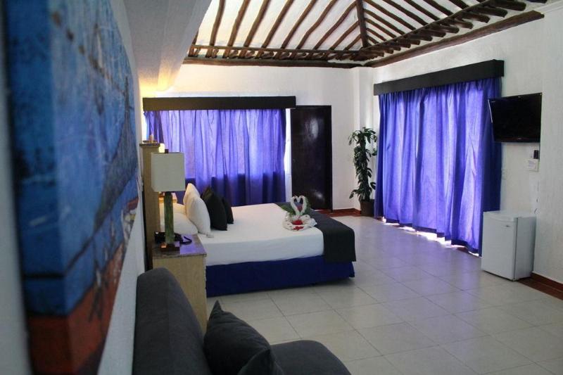 Отель Pueblo Caribe Beach Club