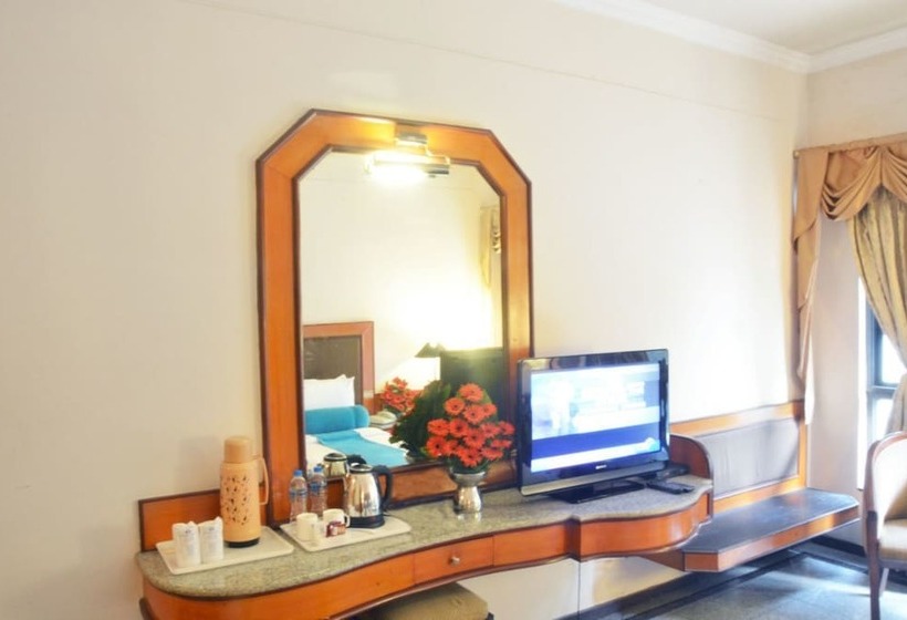 Отель Ashraya International