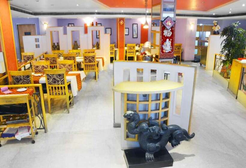 Отель Ashraya International