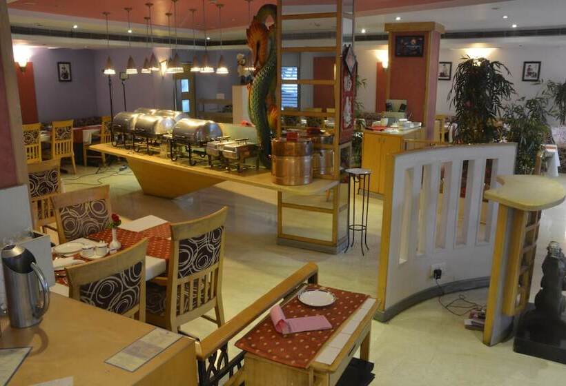 Отель Ashraya International