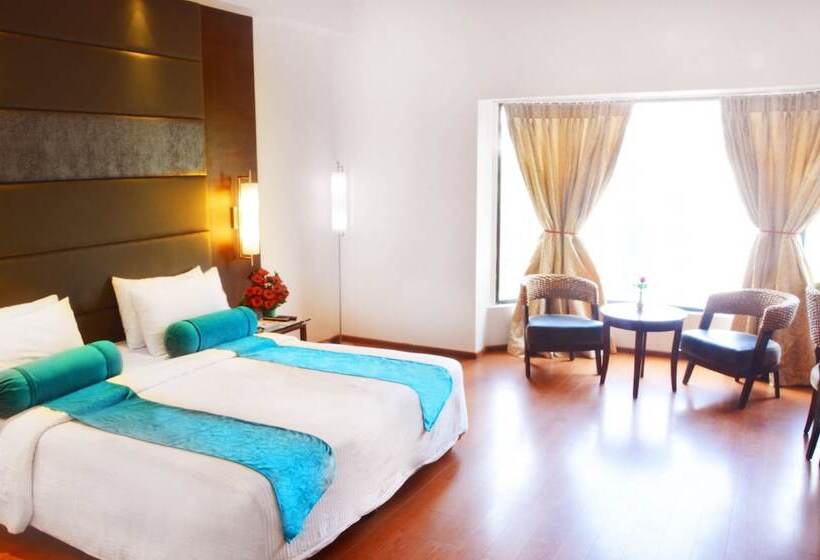 Отель Ashraya International