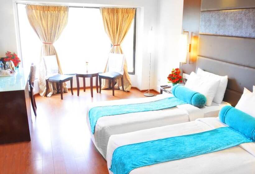 Отель Ashraya International