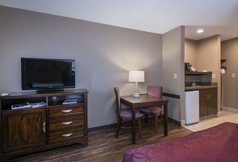 Отель Guest Inn & Suites  Midtown Medical Center