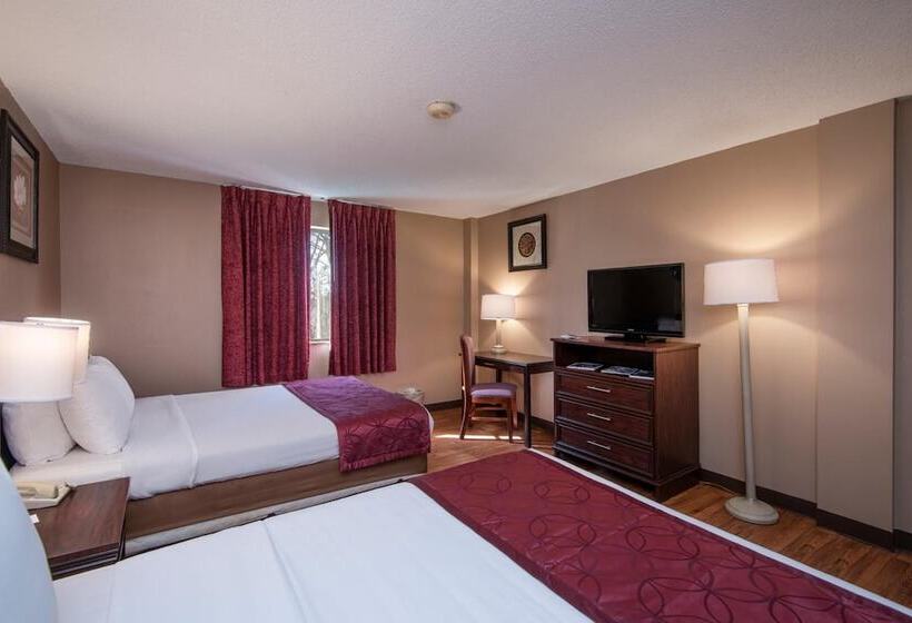 Отель Guest Inn & Suites  Midtown Medical Center