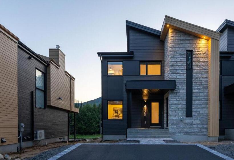 ホテル Hebergement Montsteanne Condos