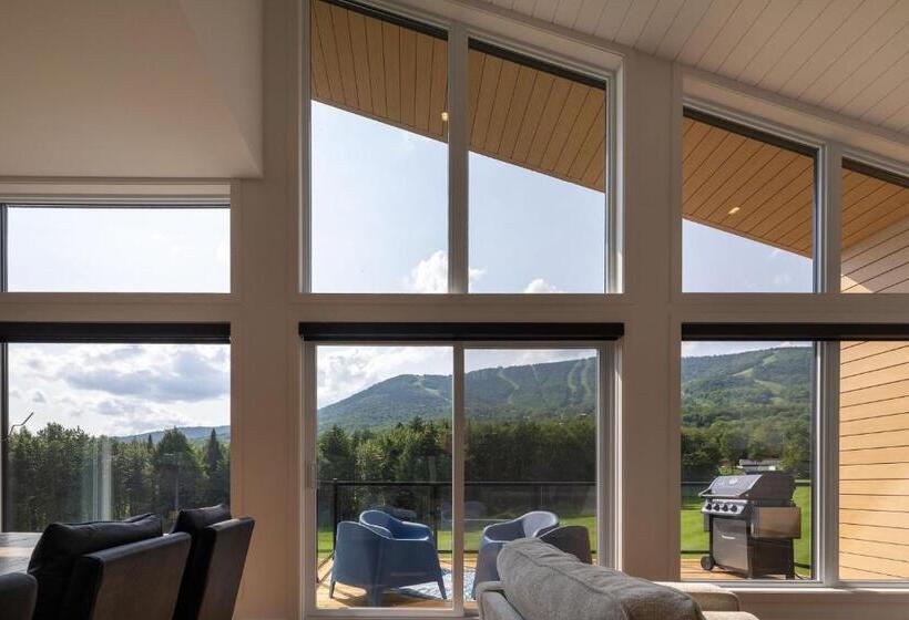 ホテル Hebergement Montsteanne Condos