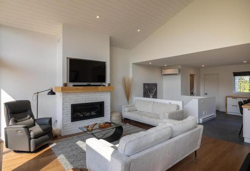 ホテル Hebergement Montsteanne Condos