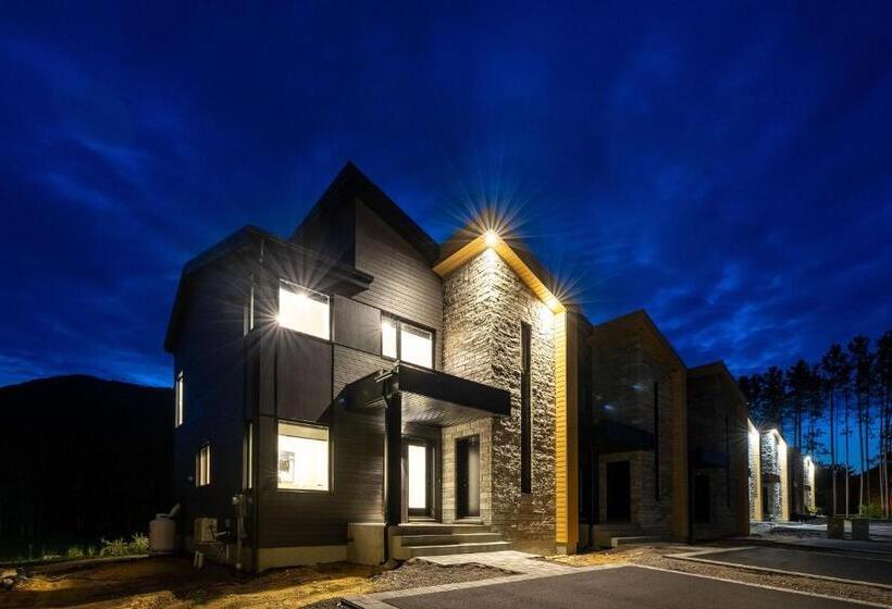 ホテル Hebergement Montsteanne Condos