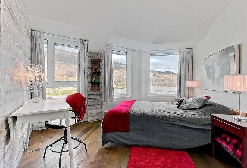 ホテル Hebergement Montsteanne Condos