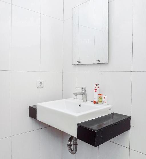 Отель Triza By Oyo Rooms