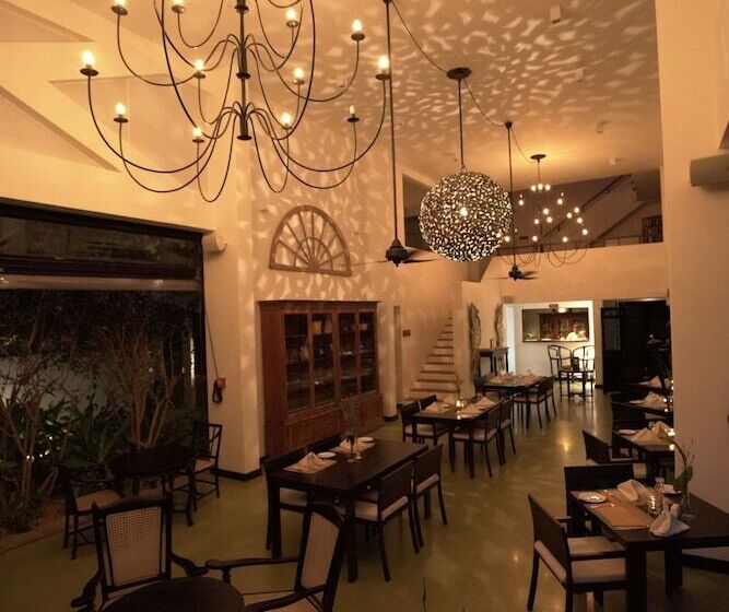 호텔 Calamansi Cove Villas