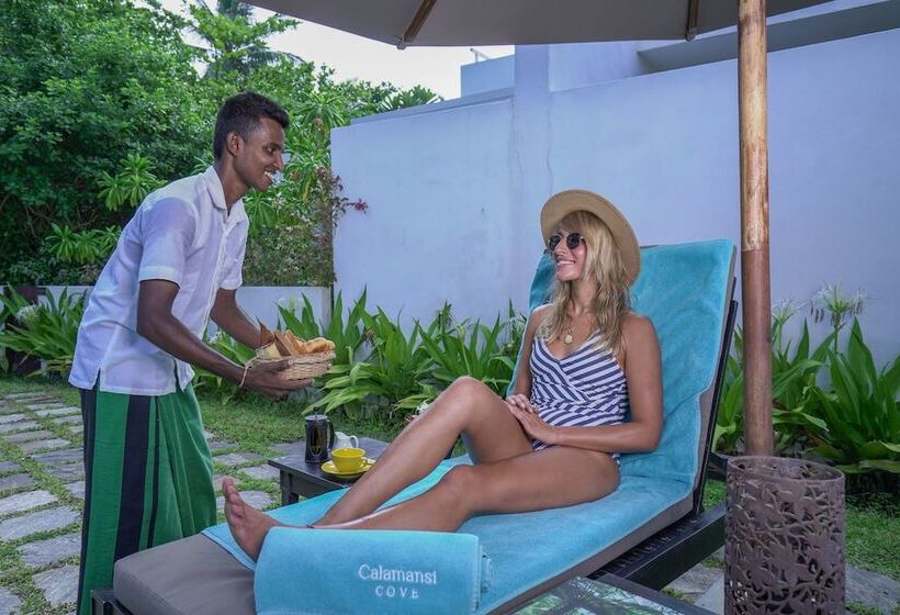 호텔 Calamansi Cove Villas