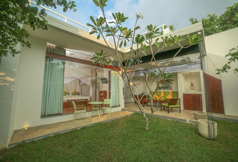 호텔 Calamansi Cove Villas