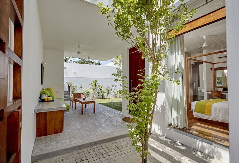 호텔 Calamansi Cove Villas