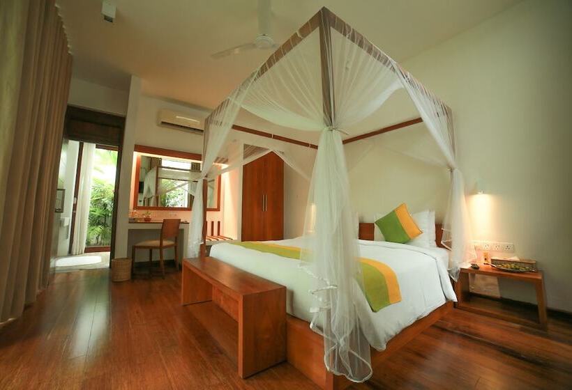 호텔 Calamansi Cove Villas