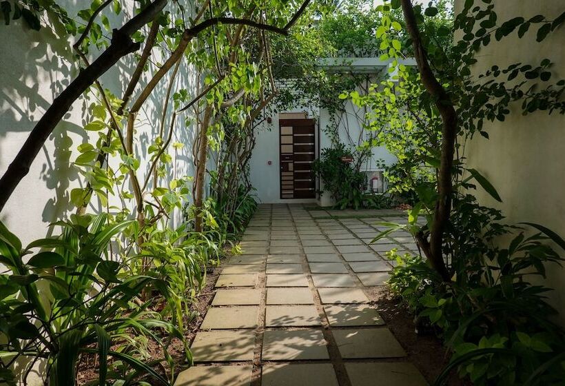 호텔 Calamansi Cove Villas