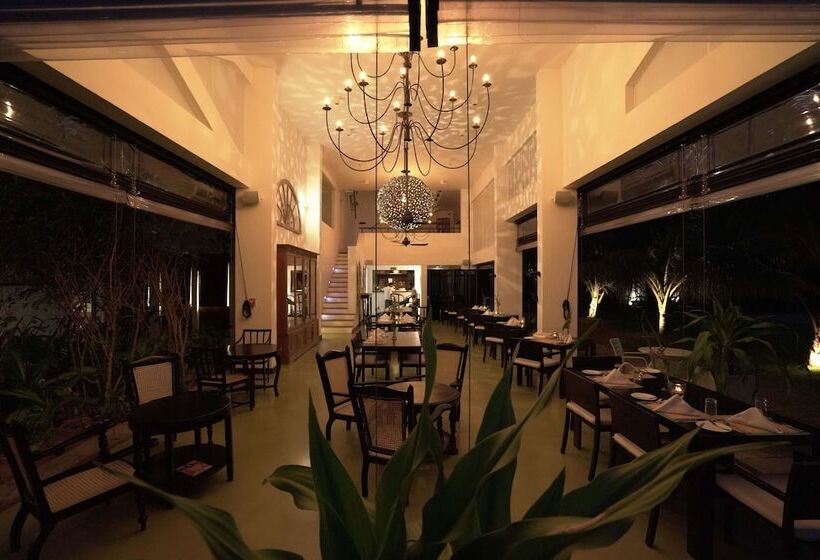 호텔 Calamansi Cove Villas