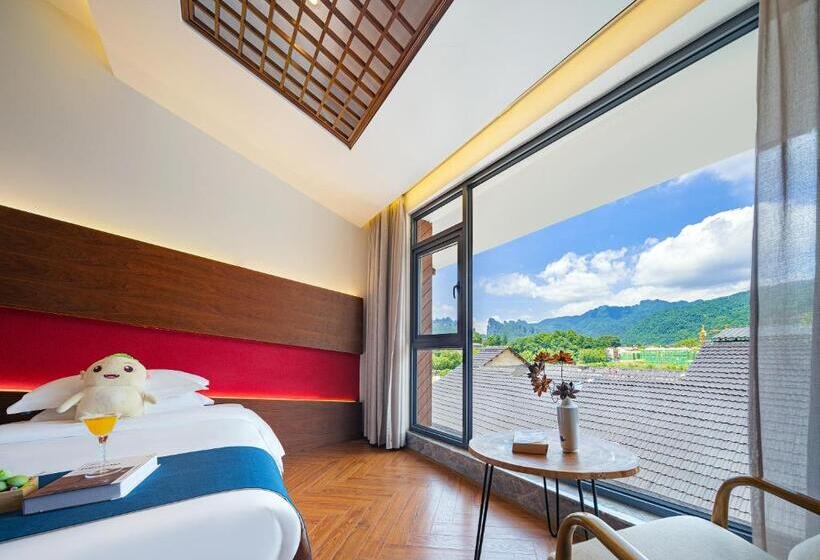 בית מלון כפרי 張家界武陵源北岸輕奢客棧 森林公園店