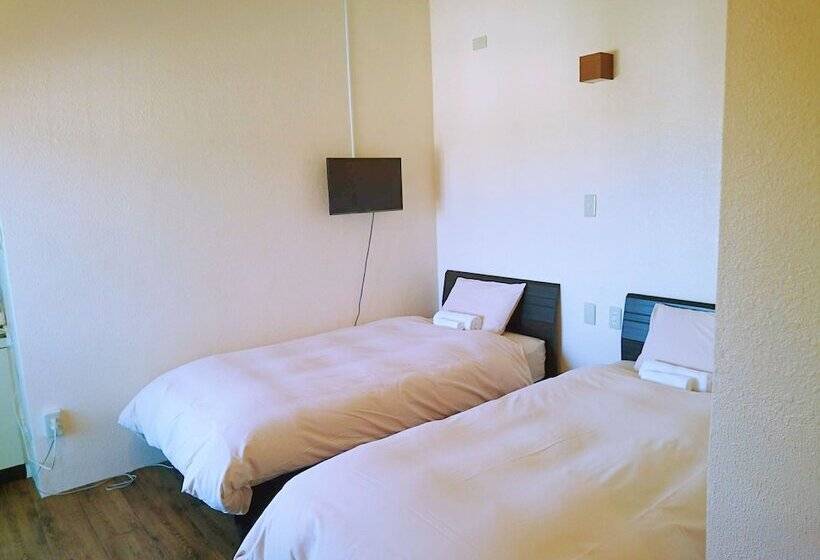 בית מלון כפרי Eef Condominium Kumejima