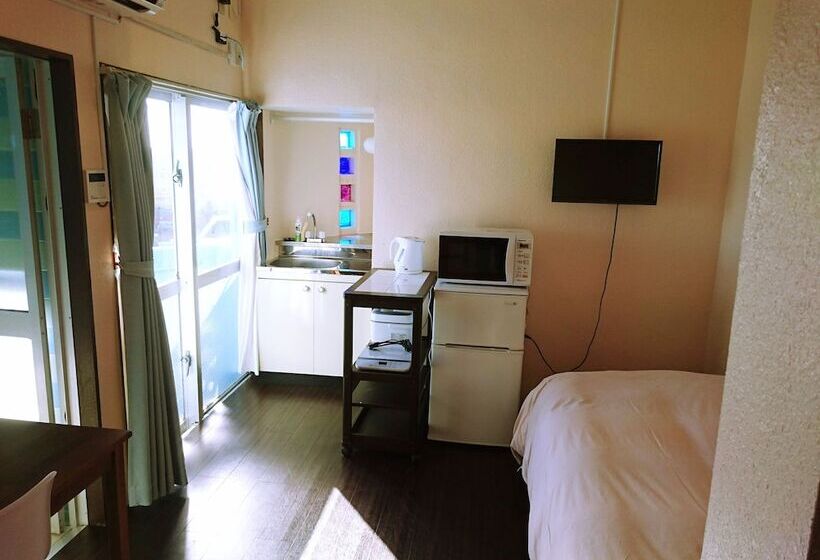 בית מלון כפרי Eef Condominium Kumejima