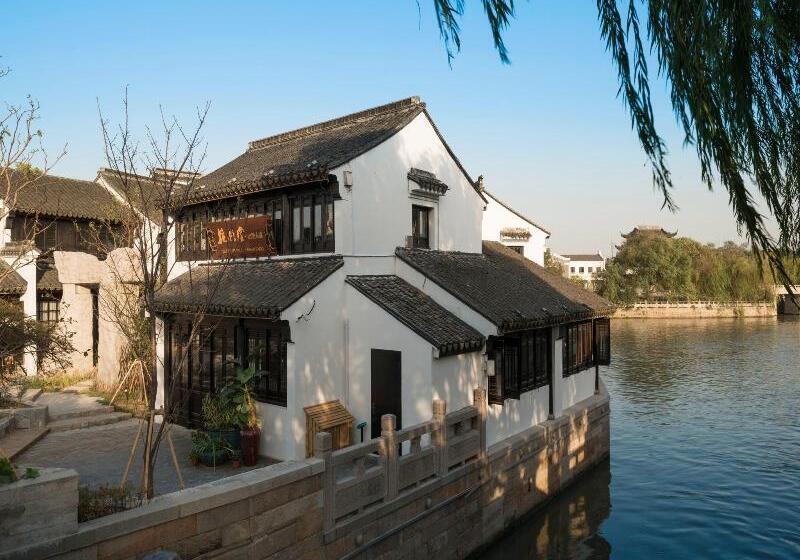 هتل Blossom Hill Inn · Shantang