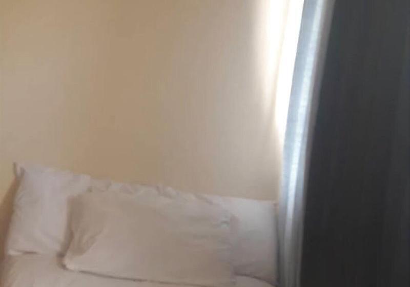 Отель Ekonumi Rooms At Benrosi Plaza