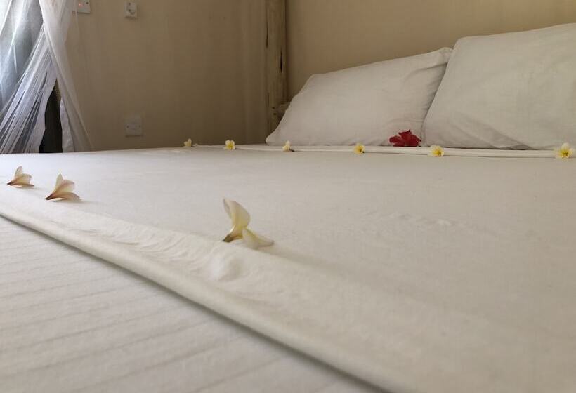 בית מלון כפרי Blue Earth Beach Bungalow