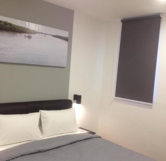 בית מלון כפרי Carlton Inn Bukit Ubi