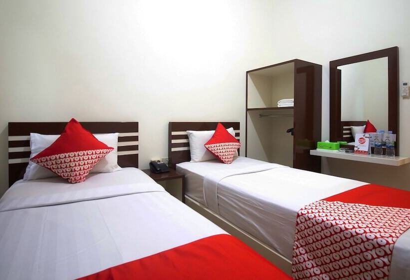 Отель Reddoorz At Andalas Asri