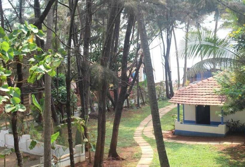 호텔 Dhuni Resorts Goa