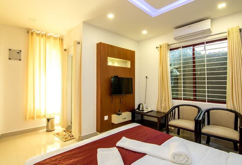 호텔 Edakkal Village Resort