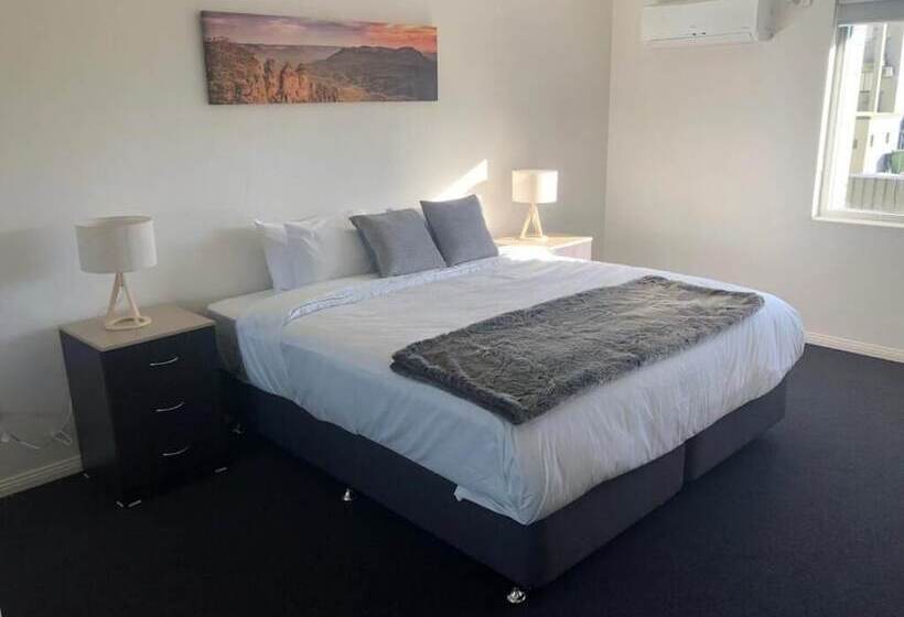 מוטל Carlton Suites