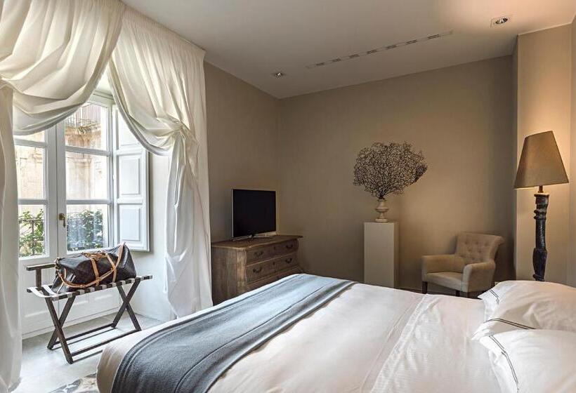 צימר Seven Rooms Villadorata