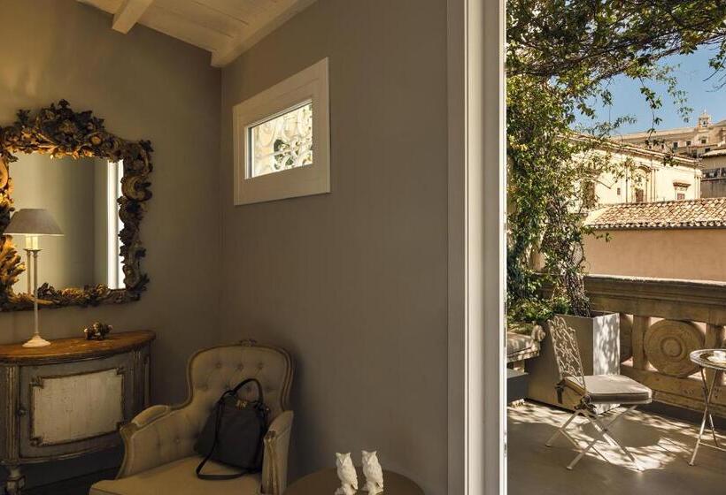 צימר Seven Rooms Villadorata