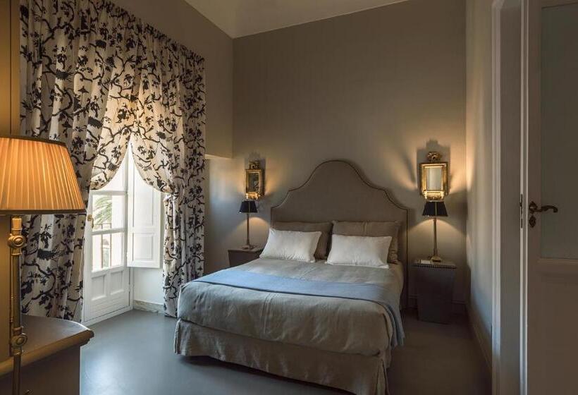 צימר Seven Rooms Villadorata