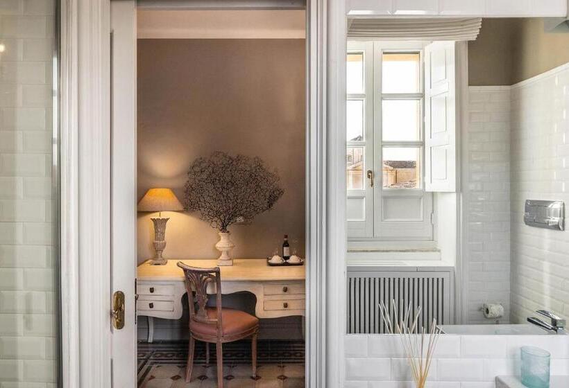 צימר Seven Rooms Villadorata