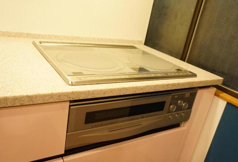 הוסטל Guesthouse Arigato