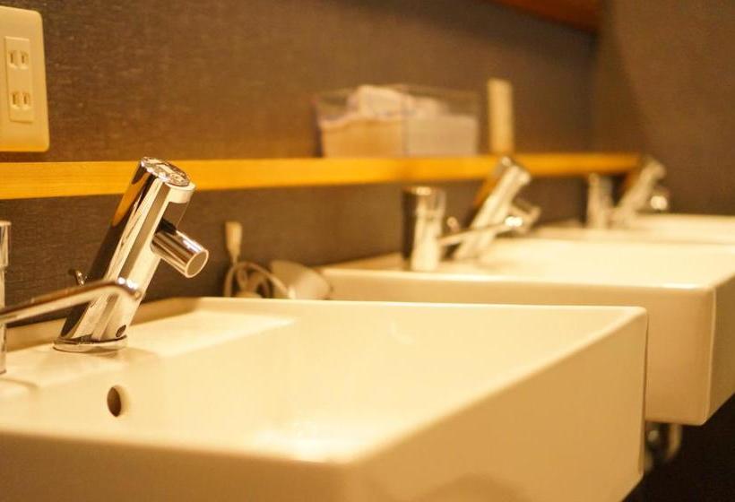 הוסטל Guesthouse Arigato