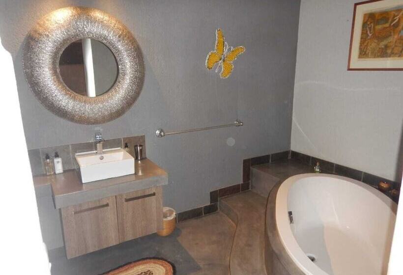 בית מלון כפרי Call Of The Wild Lodge