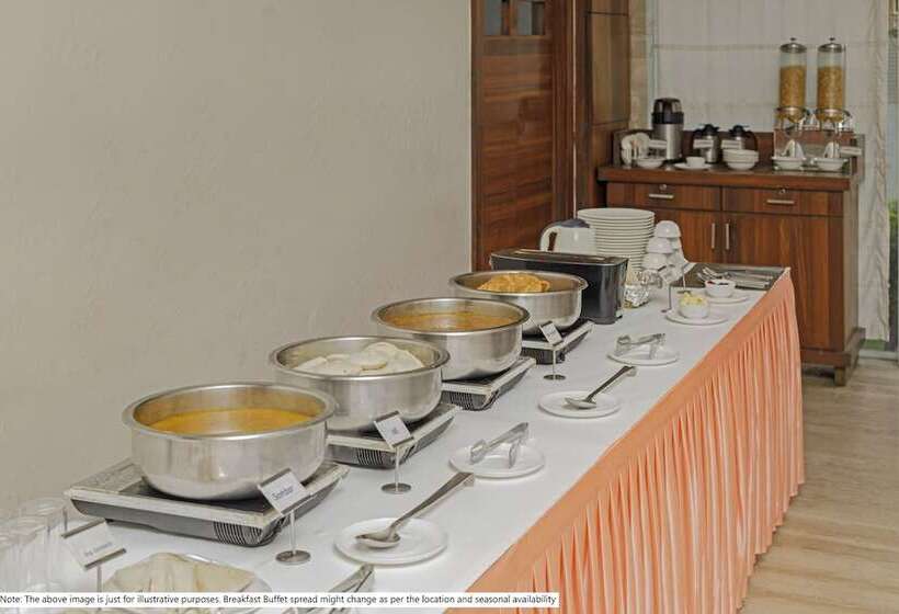 Отель Treebo Shree Sai Suites