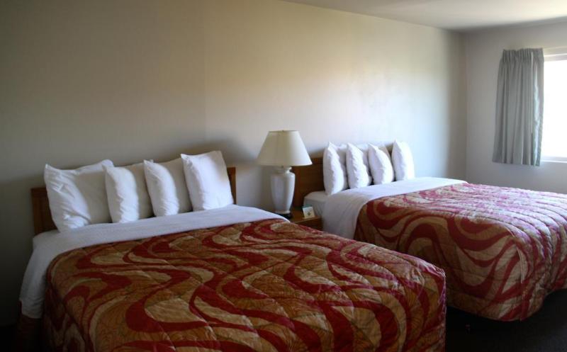 Отель Aladdin Inn And Suites