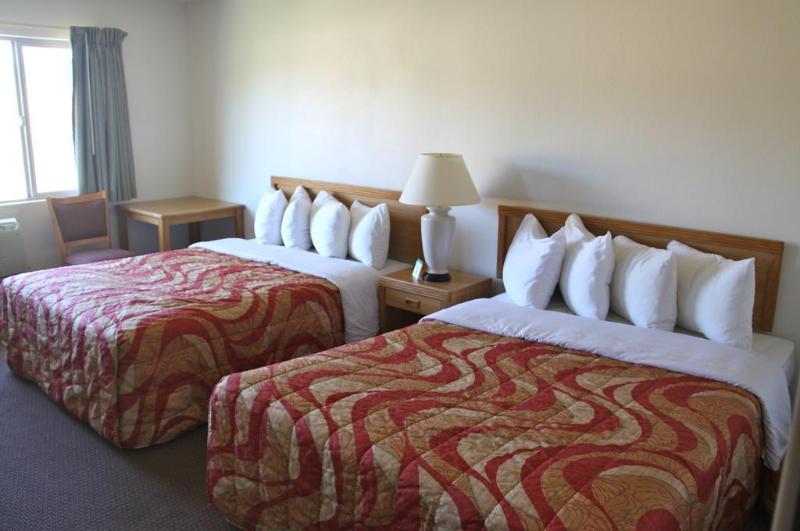 Отель Aladdin Inn And Suites