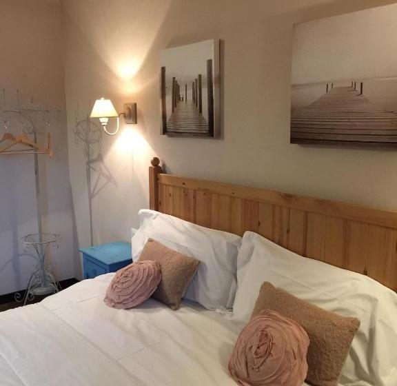 تختخواب و صبحانه Casa Rosa