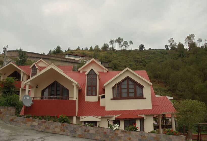 هتل Manla Homes Resort