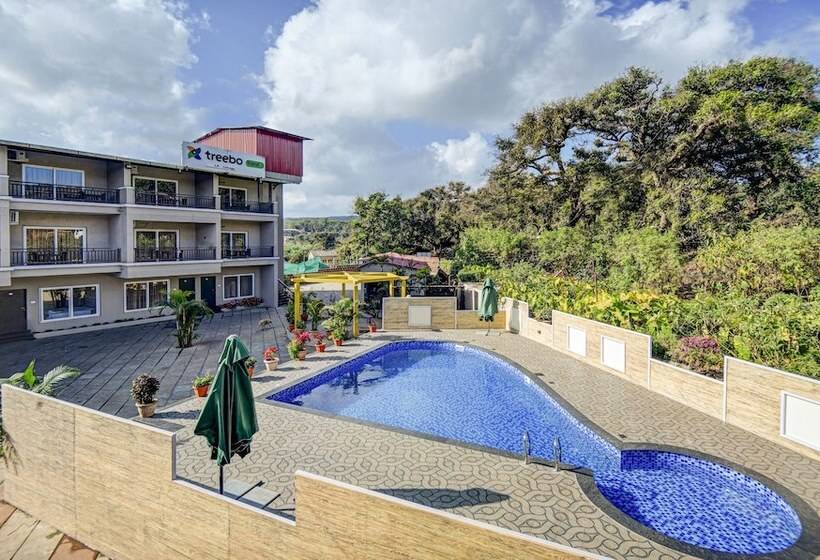 Отель Treebo Jp Cottage